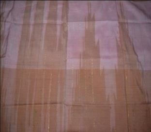 Kain sutra bermotif Balo Cobo'